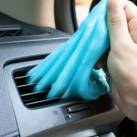 Car cleaning gel removing dust from air vents and interior trim