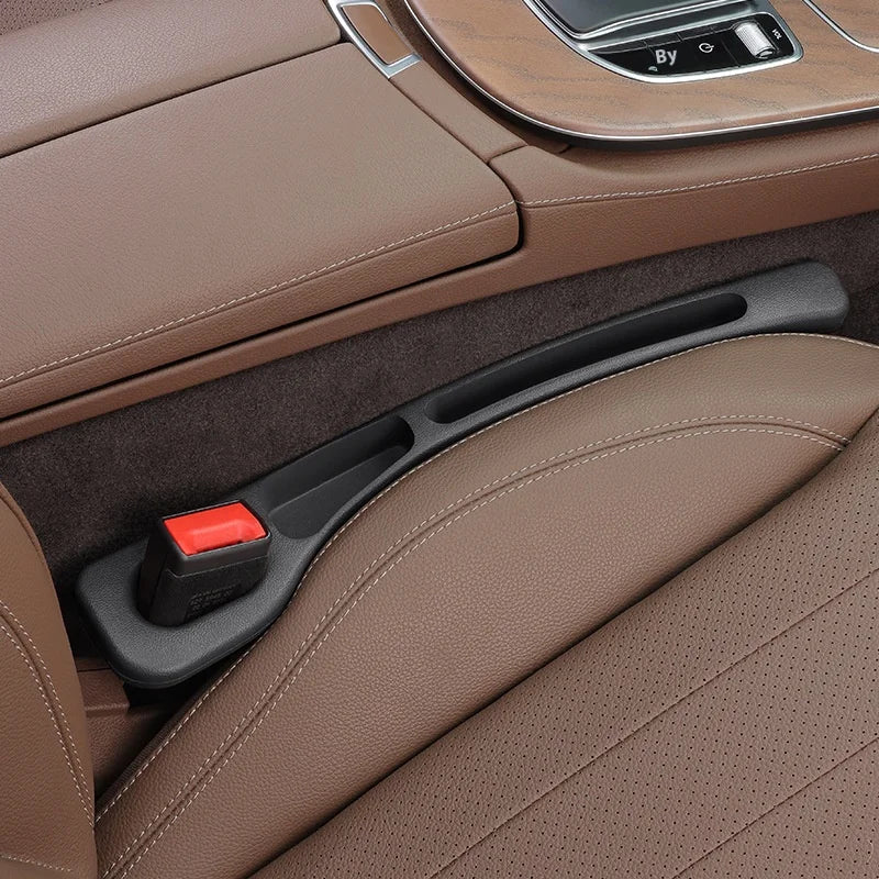 Realexity GapGuard car seat gap filler preventing phone and keys from falling between seat and console